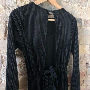 Black velvet jumpsuit with open back keyhole back